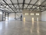 Аренда отапливаемого производственно-складского помещения 1088 м² | 150 кВт, 2 ворот, офис и душевые